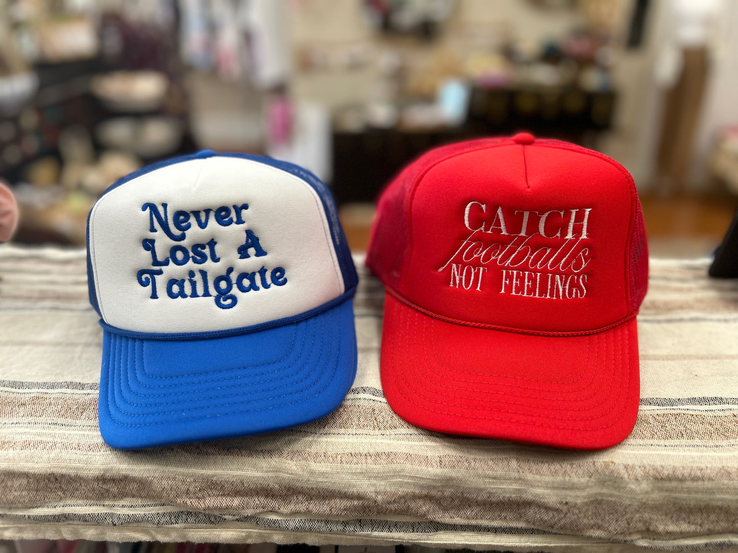 Catch Footballs Not Feelings Embroidered Trucker Hat