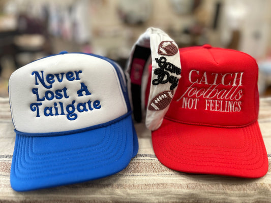 Catch Footballs Not Feelings Embroidered Trucker Hat